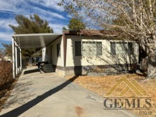 Undisclosed Address Ridgecrest, CA 93555 - Photo 2 of 30 a view of a house with basketball court