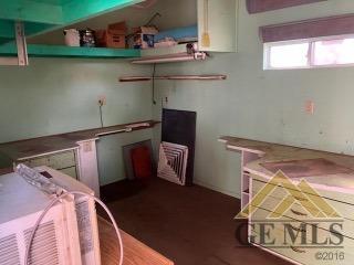 Undisclosed Address Ridgecrest, CA 93555 - Photo 22 of 30 a view of a room with rack on the wall