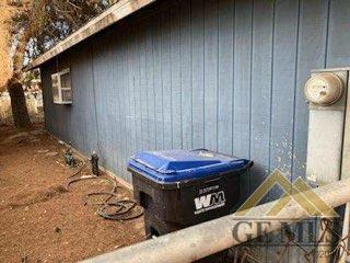 Undisclosed Address Ridgecrest, CA 93555 - Photo 27 of 30 a table and chairs in front of a house