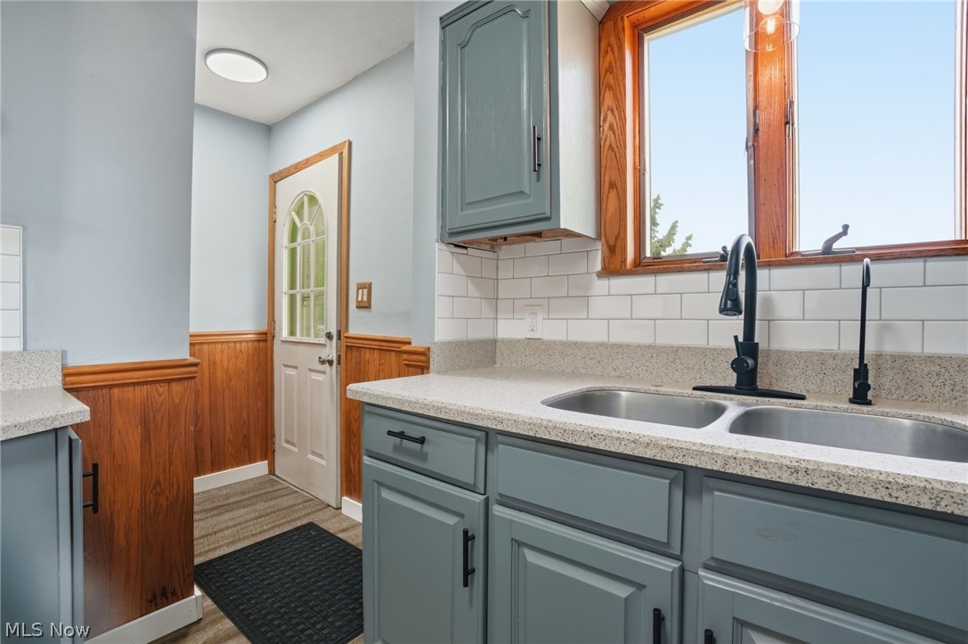 720 Keefus Road Conneaut, OH 44030 - Photo 5 of 33 Updated flooring, tile, faucet, paint.