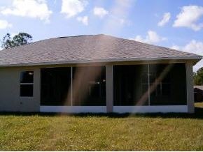 975 Southeast Cloverleaf Palm Bay, FL 32909 - Photo 2 of 6 a view of a pool