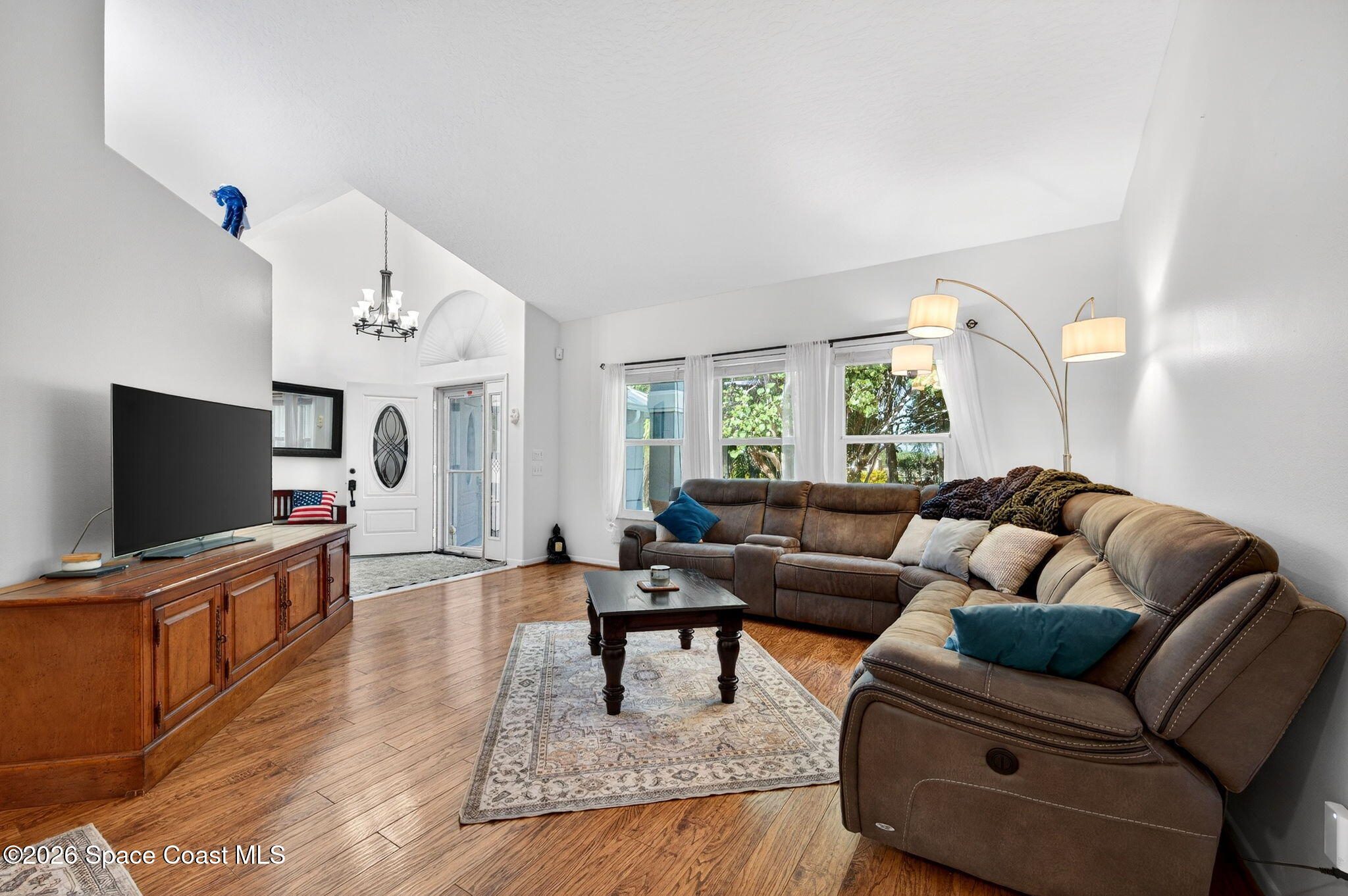 239 Deer Run Road Palm Bay, FL 32909 - Photo 13 of 46 239 Deer Run Rd Living Room to Foyer