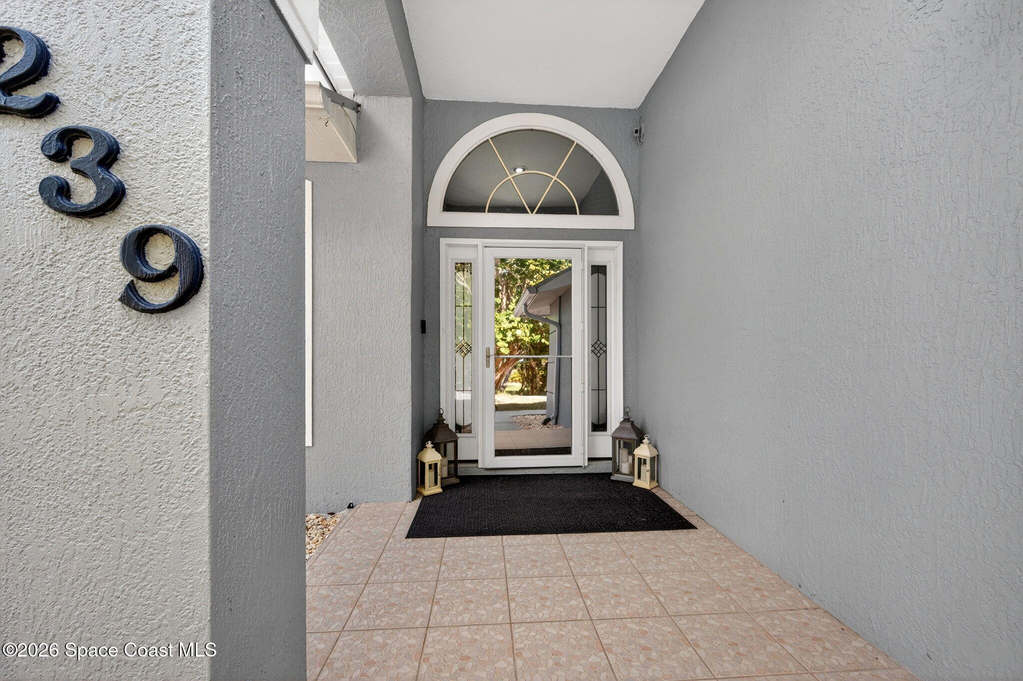 239 Deer Run Road Palm Bay, FL 32909 - Photo 33 of 46 239 Deer Run Rd entrance