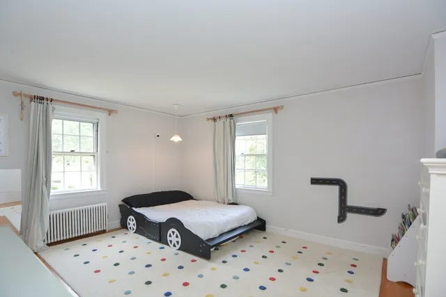 a room with furniture and a window