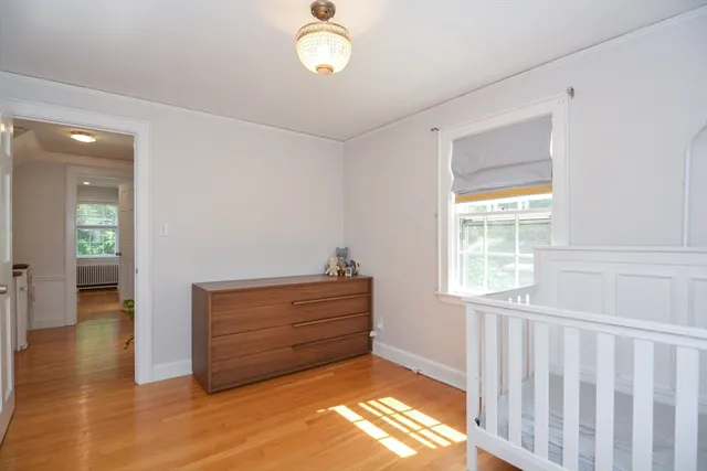 a view of a bedroom from a hallway