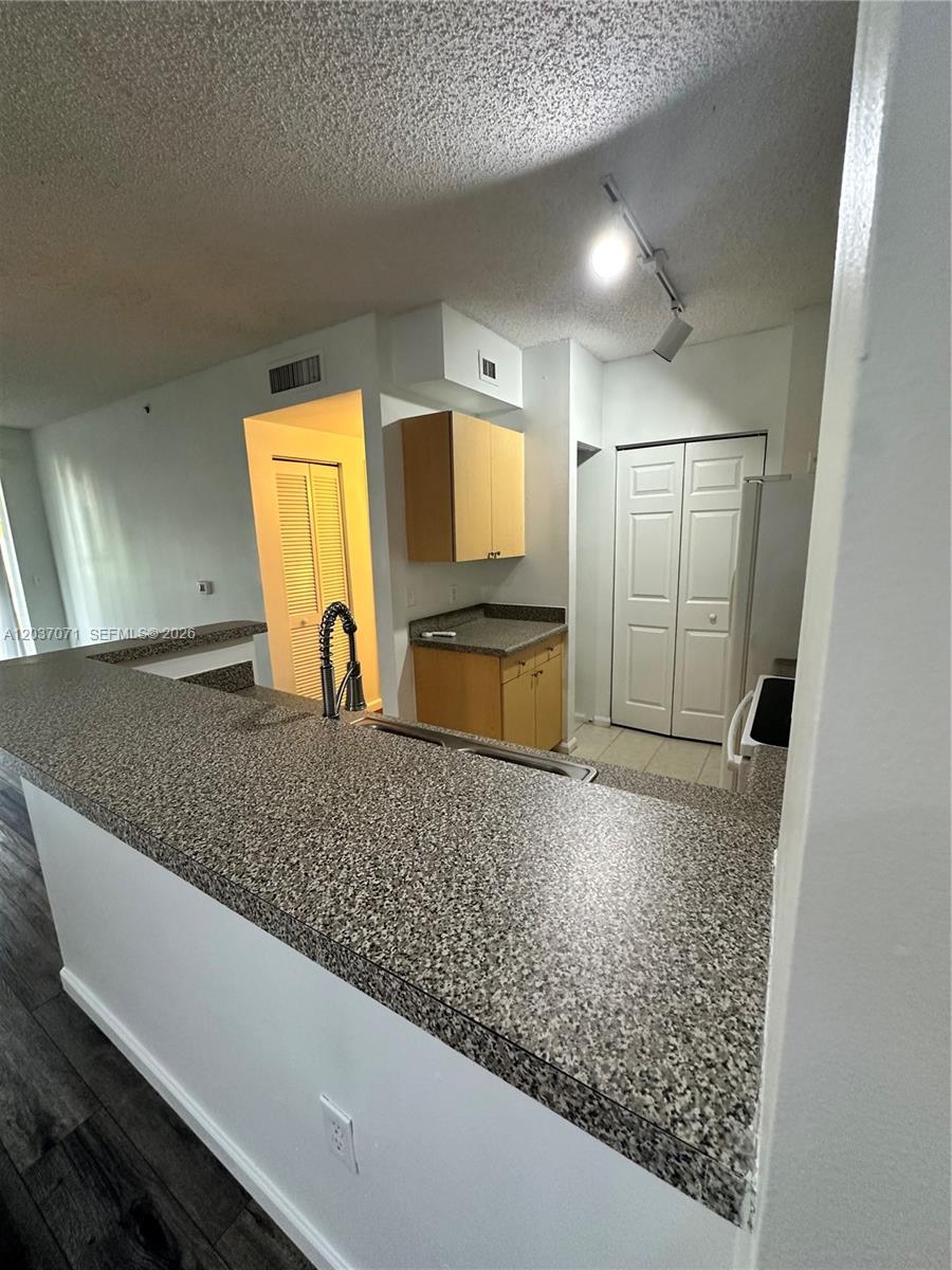 8050 North Nob Hill Road, Unit 102 Tamarac, FL 33321 - Photo 3 of 10