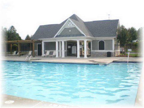 12755 Morningpark Circle Alpharetta, GA 30004 - Photo 36 of 36 a front view of the house with outdoor seating