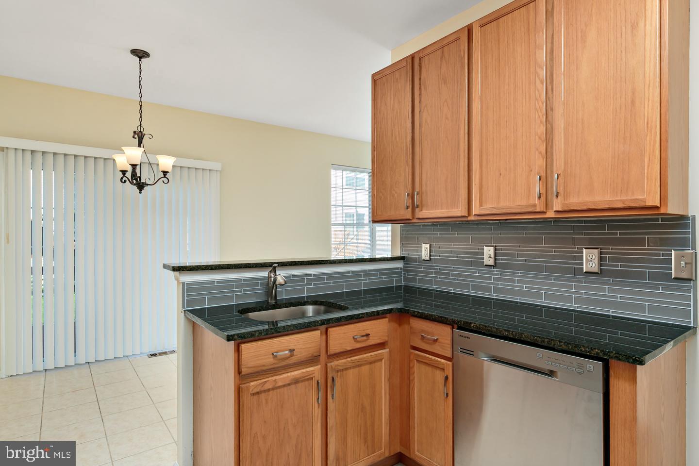 104 Castleton Road Delran, NJ 08075 - Photo 16 of 30 Kitchen and sliding door to deck