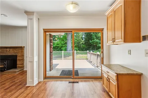 a bedroom with bed and balcony