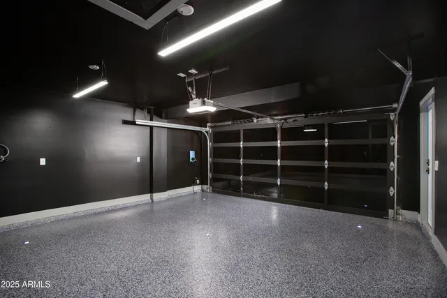 a small space with a stove and a microwave