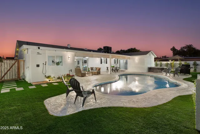 a swimming pool view with a outdoor space