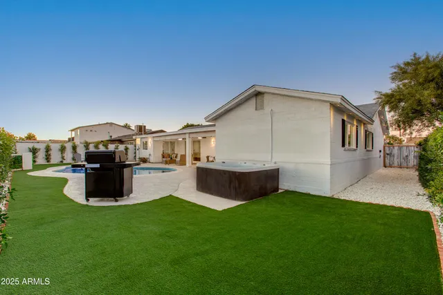 swimming pool view with a outdoor seating space