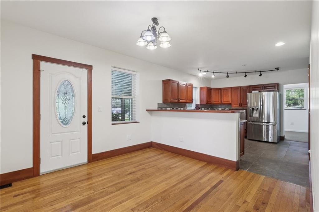 115 Enon Road Darlington, PA 16115 - Photo 11 of 50 a kitchen with stainless steel appliances granite countertop a refrigerator sink and cabinets