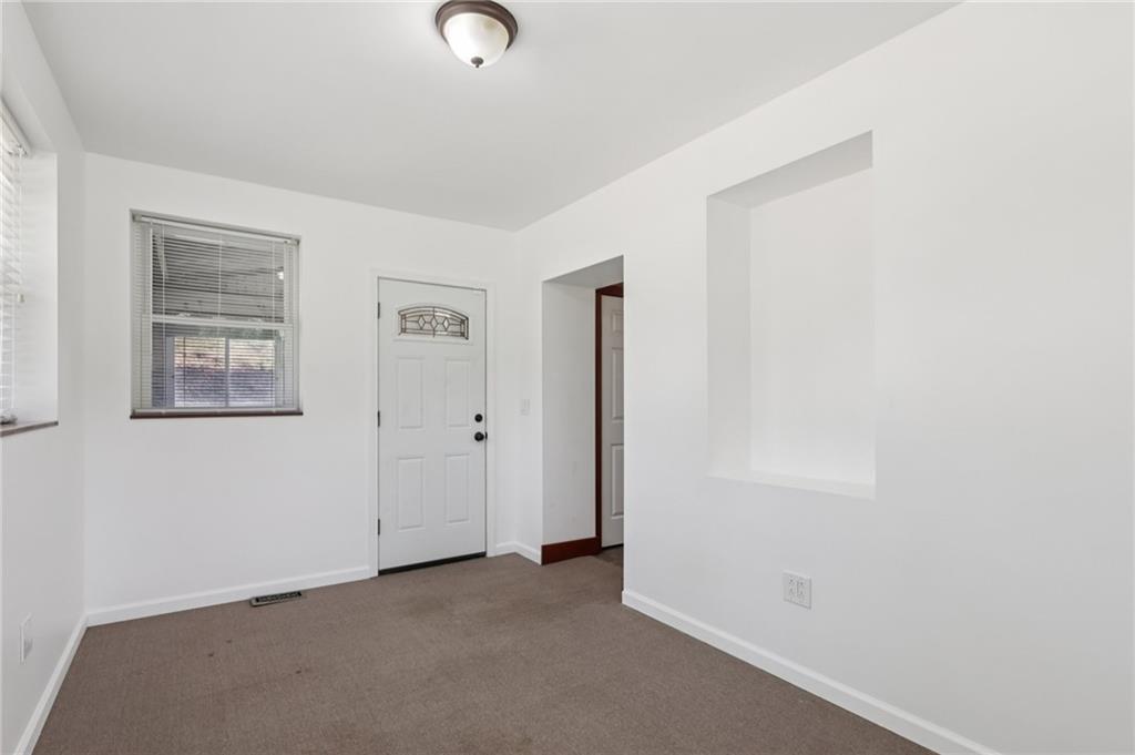 115 Enon Road Darlington, PA 16115 - Photo 17 of 50 an empty room with windows