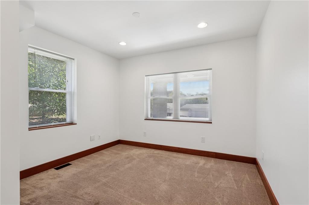 115 Enon Road Darlington, PA 16115 - Photo 18 of 50 an empty room with windows