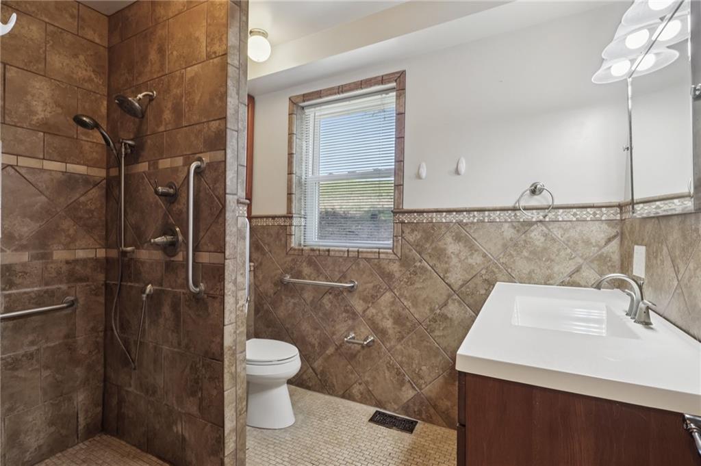 115 Enon Road Darlington, PA 16115 - Photo 20 of 50 a bathroom with a sink toilet and shower