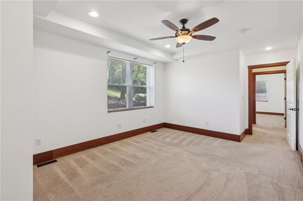 115 Enon Road Darlington, PA 16115 - Photo 22 of 50 an empty room with ceiling fan and window