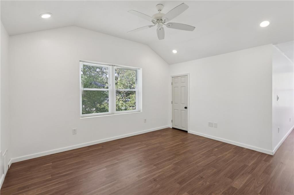 115 Enon Road Darlington, PA 16115 - Photo 23 of 50 an empty room with wooden floor and windows