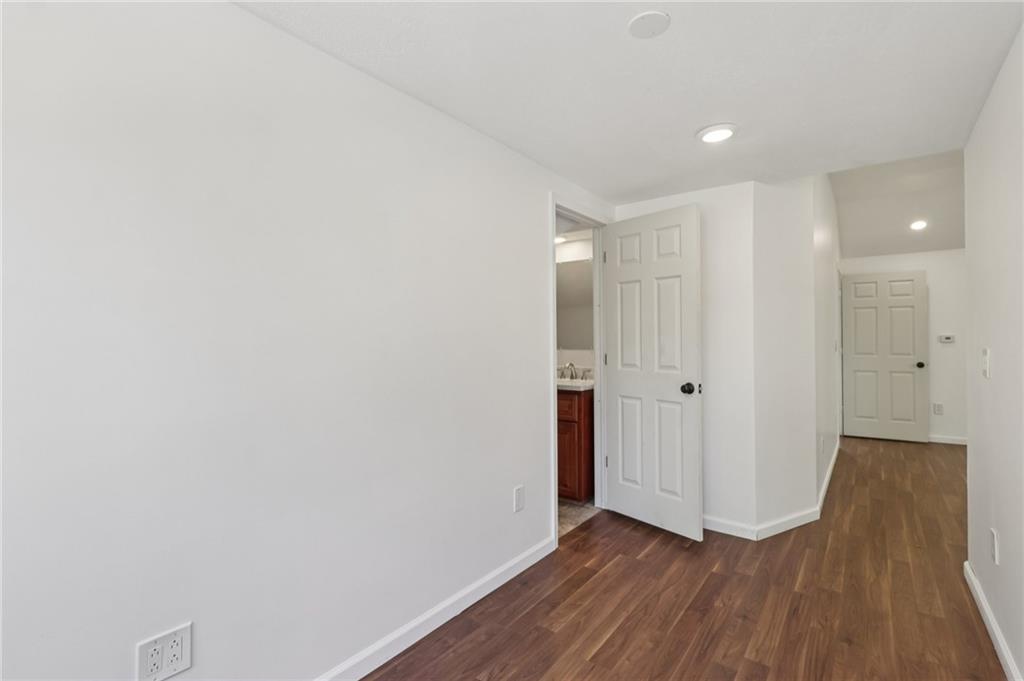 115 Enon Road Darlington, PA 16115 - Photo 26 of 50 a view of hallway with wooden floor