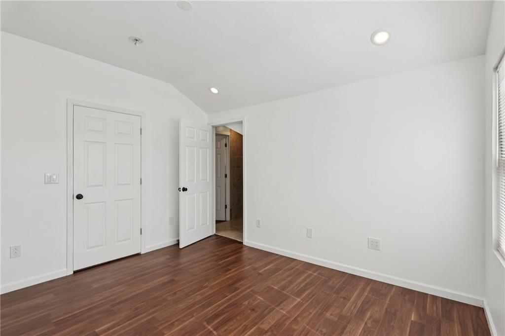 115 Enon Road Darlington, PA 16115 - Photo 30 of 50 a view of an empty room with wooden floor