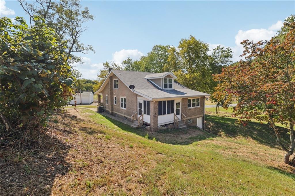 115 Enon Road Darlington, PA 16115 - Photo 3 of 50 a house with trees in the background