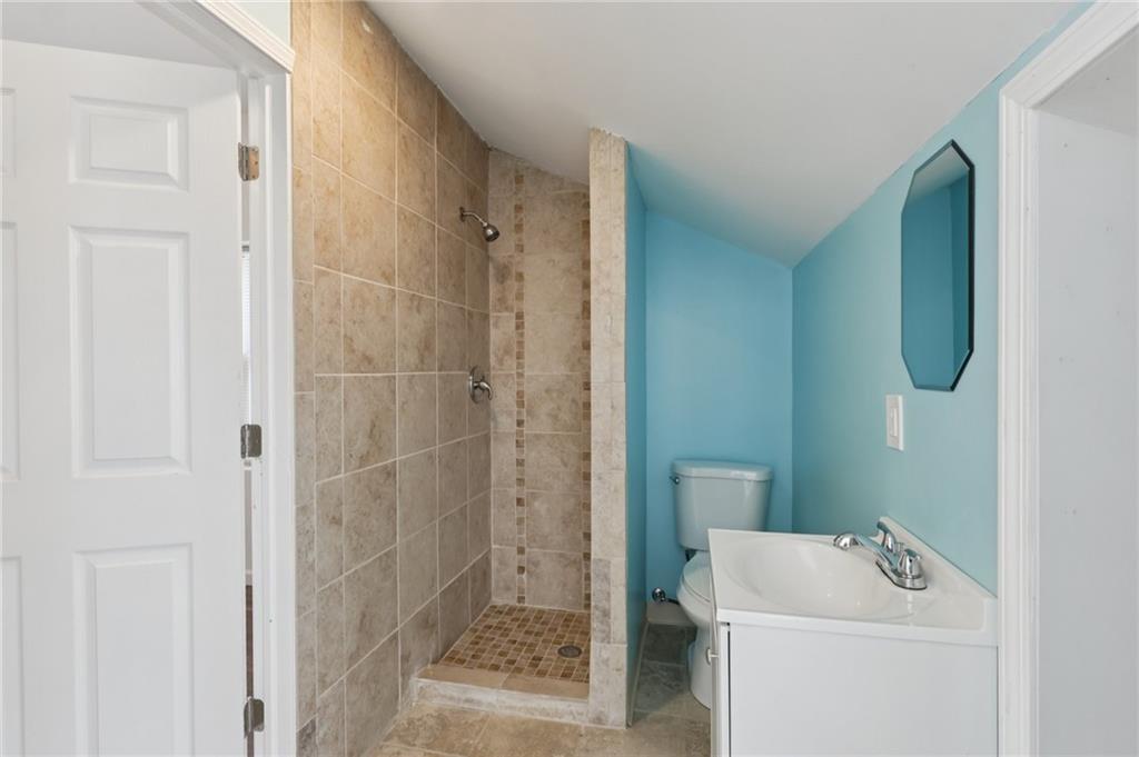 115 Enon Road Darlington, PA 16115 - Photo 31 of 50 a bathroom with a sink a toilet and shower