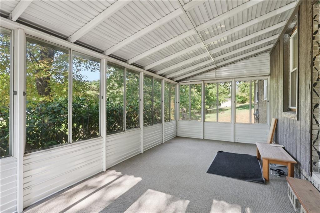 115 Enon Road Darlington, PA 16115 - Photo 35 of 50 a room with large windows and furniture