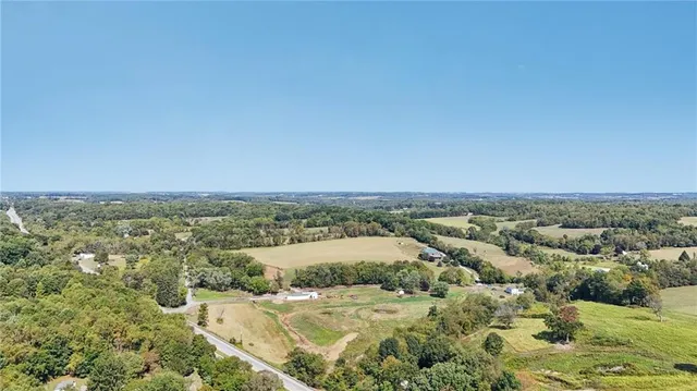 an aerial view of residential houses and outdoor space