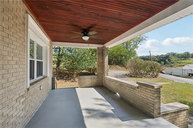 a view of a porch and garden