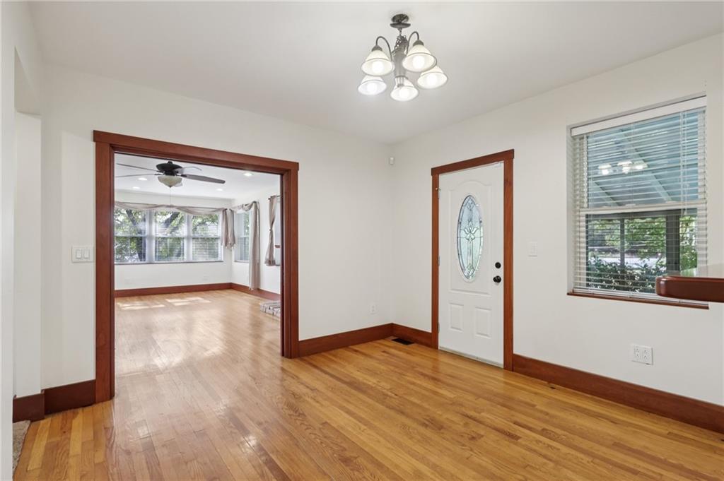 115 Enon Road Darlington, PA 16115 - Photo 10 of 50 a view of an empty room with wooden floor and a window