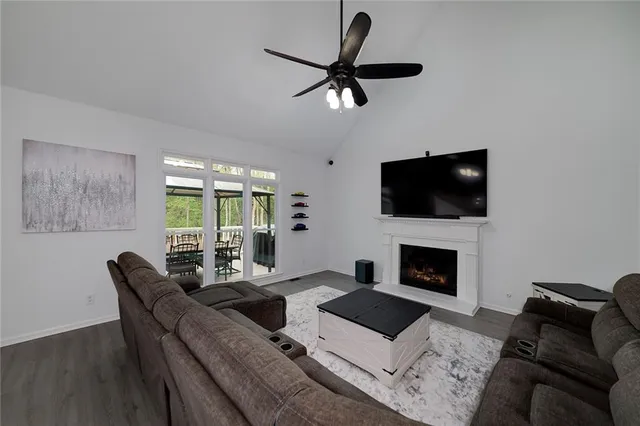 a view of entryway with wooden floor and stairs