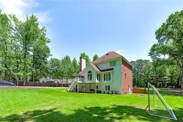 a view of a house with a park