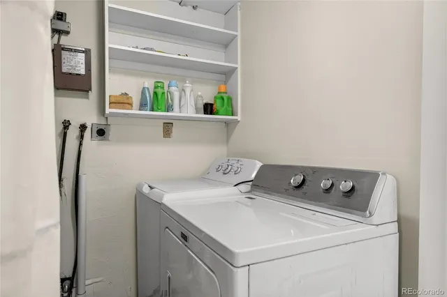 a utility room with dryer and washer