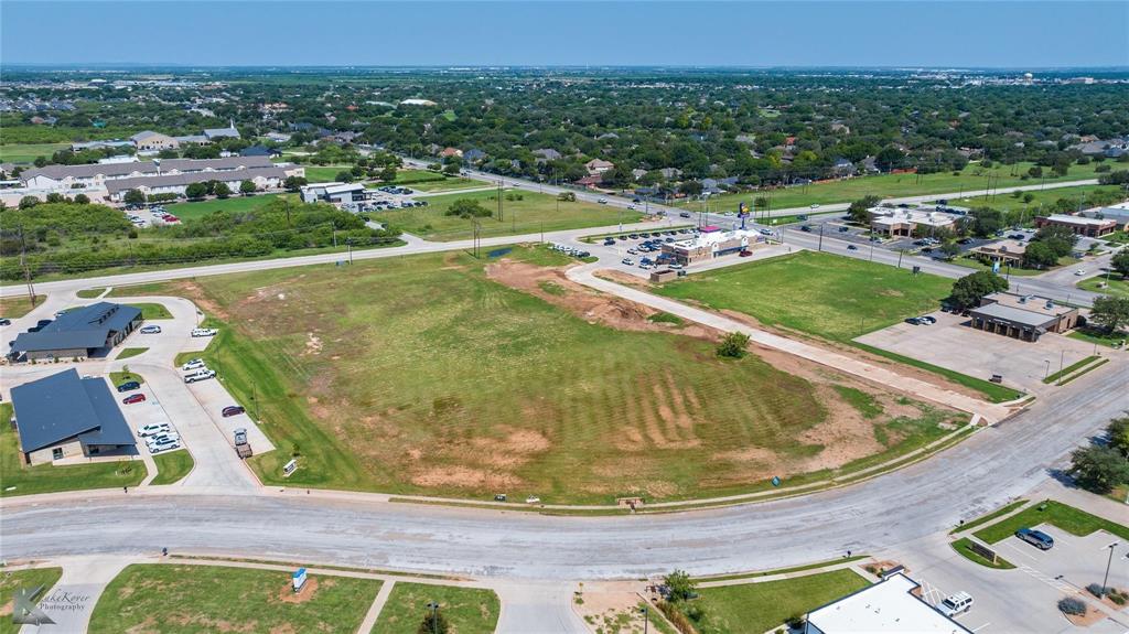2141 Antilley Road Abilene, TX 79606 - Photo 11 of 13 a view of a swimming pool with a yard