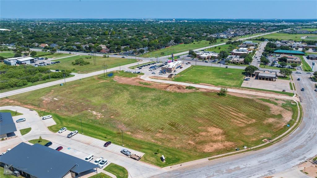 2141 Antilley Road Abilene, TX 79606 - Photo 12 of 13 a view of a swimming pool with a yard
