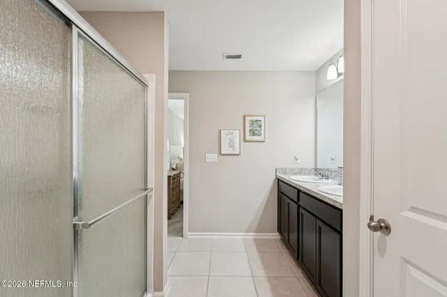 a view of a kitchen from the hallway