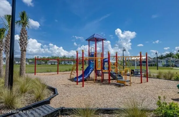 a view of a park with slide