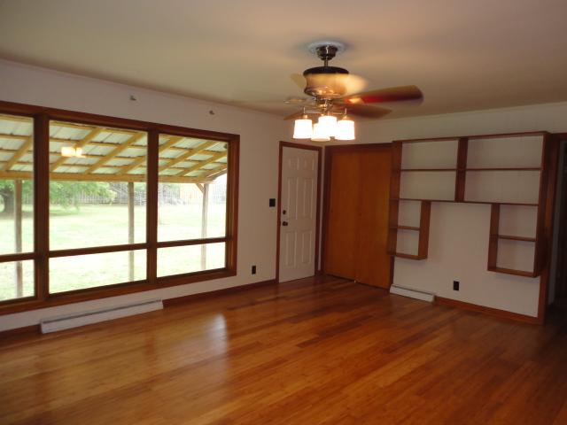 106 Doak Road Manchester, TN 37355 - Photo 4 of 19 The dining room 14x18 with new bamboo flooring and built in shelving. Your guests will have plenty of room around the dinner table at holidays and gatherings in this large room.