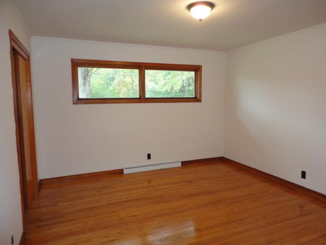 106 Doak Road Manchester, TN 37355 - Photo 8 of 19 The first Bedroom with hardwood flooring. A nice large room with beautiful windows. 12x14