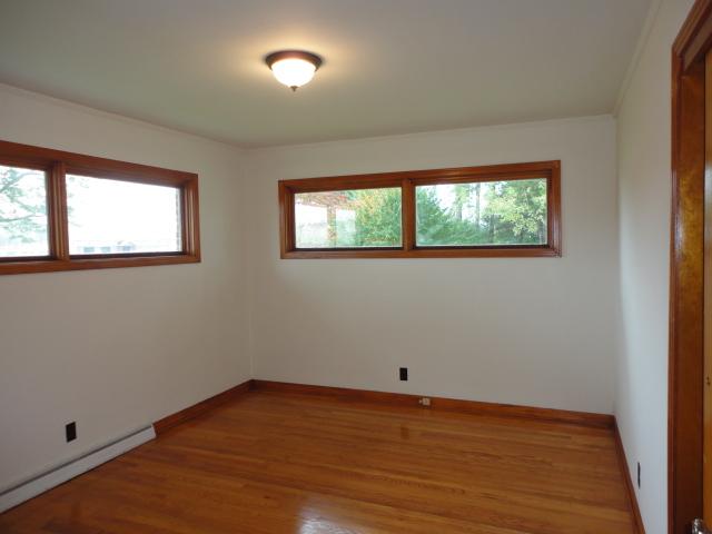 106 Doak Road Manchester, TN 37355 - Photo 9 of 19 The second Bedroom with hardwood flooring. 11x14
