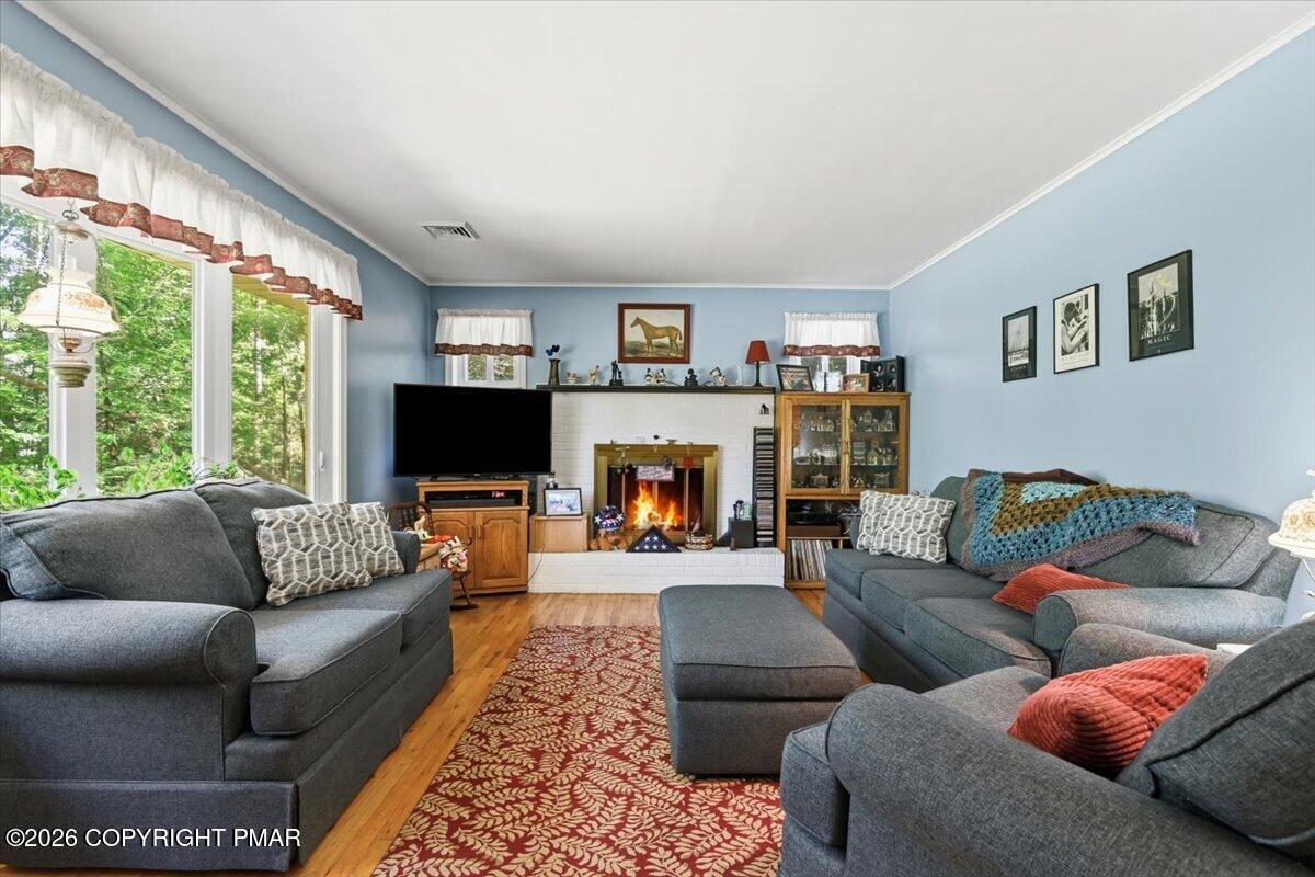 8188 Oak Ridge Lane Cresco, PA 18326 - Photo 9 of 52 12-005_DSC_2297_with_fire
