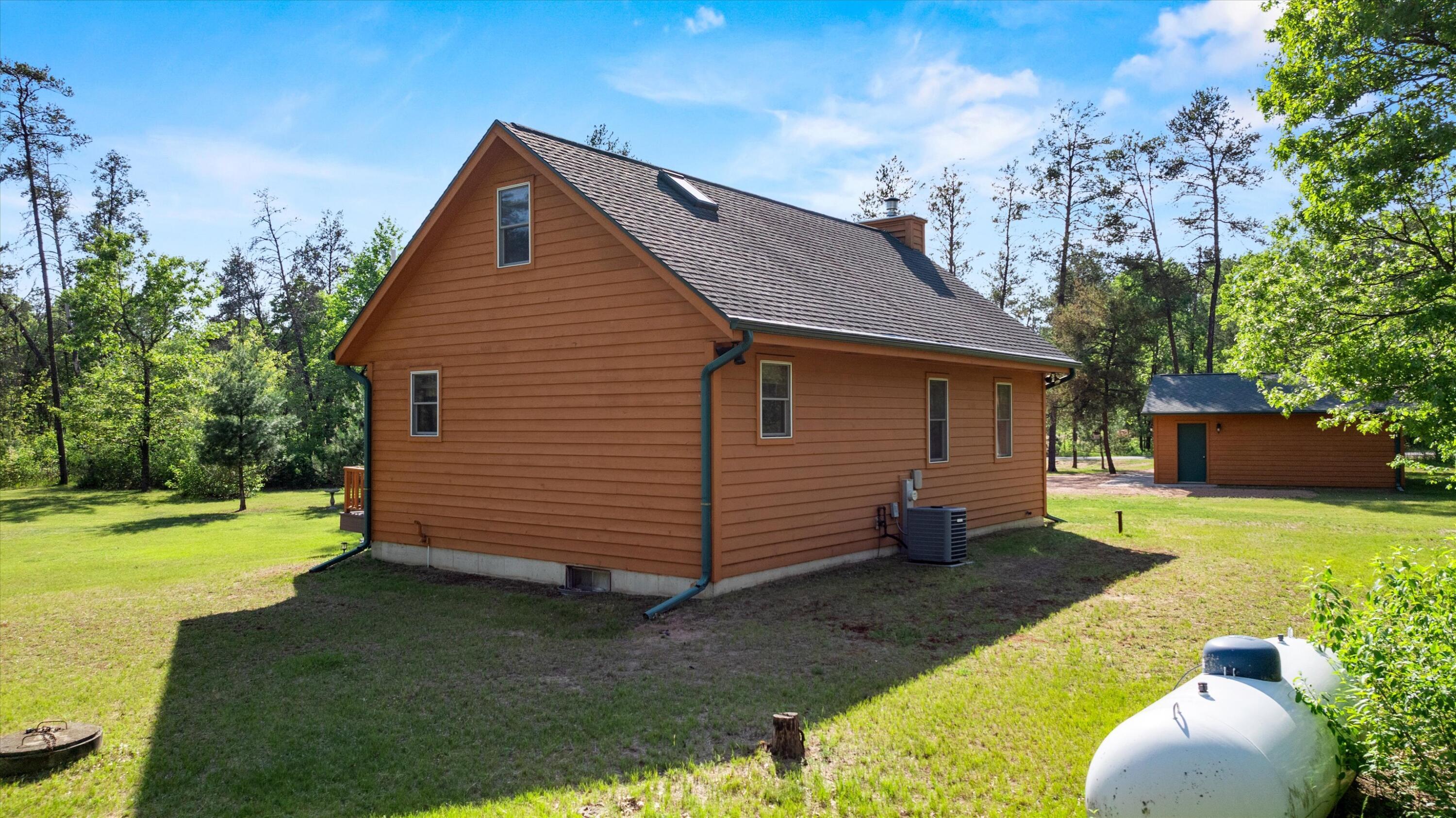 372 Yew Trail Rome, WI 54457 - Photo 35 of 39 Back of the house, propane location.