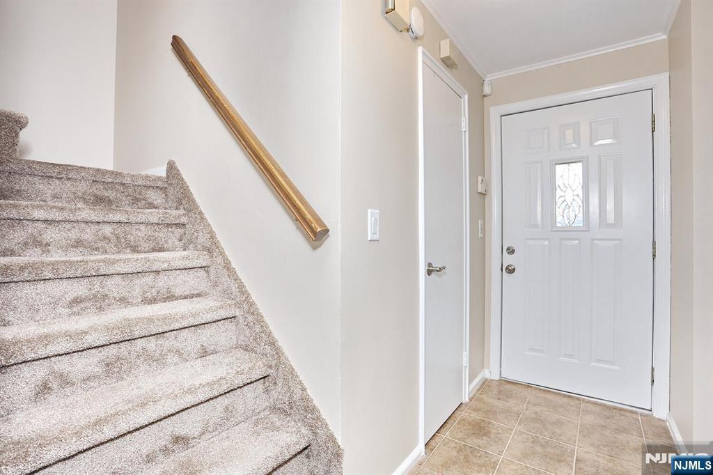 40 Depew Street Dumont, NJ 07628 - Photo 12 of 38 a view of staircase with white walls and windows