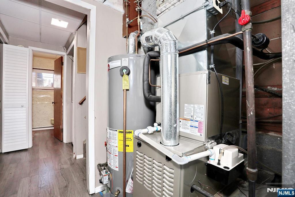 40 Depew Street Dumont, NJ 07628 - Photo 24 of 38 a living room with furniture and wooden floor