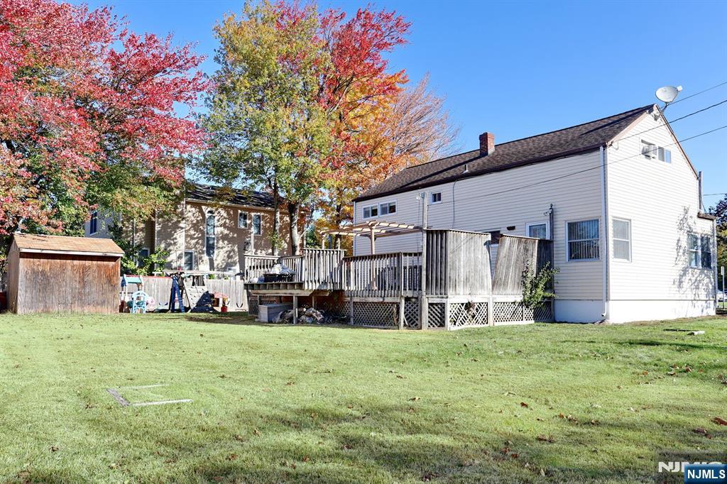 40 Depew Street Dumont, NJ 07628 - Photo 30 of 38 a view of a house with a big yard and large tree