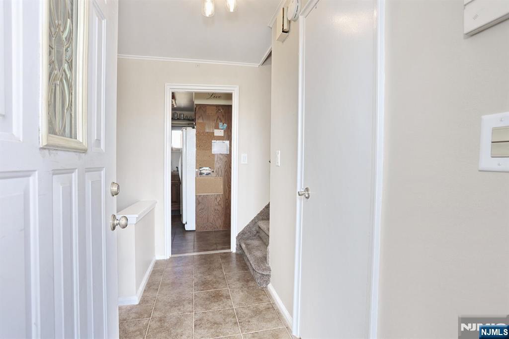 40 Depew Street Dumont, NJ 07628 - Photo 3 of 38 a view of a livingroom with bathroom and front door
