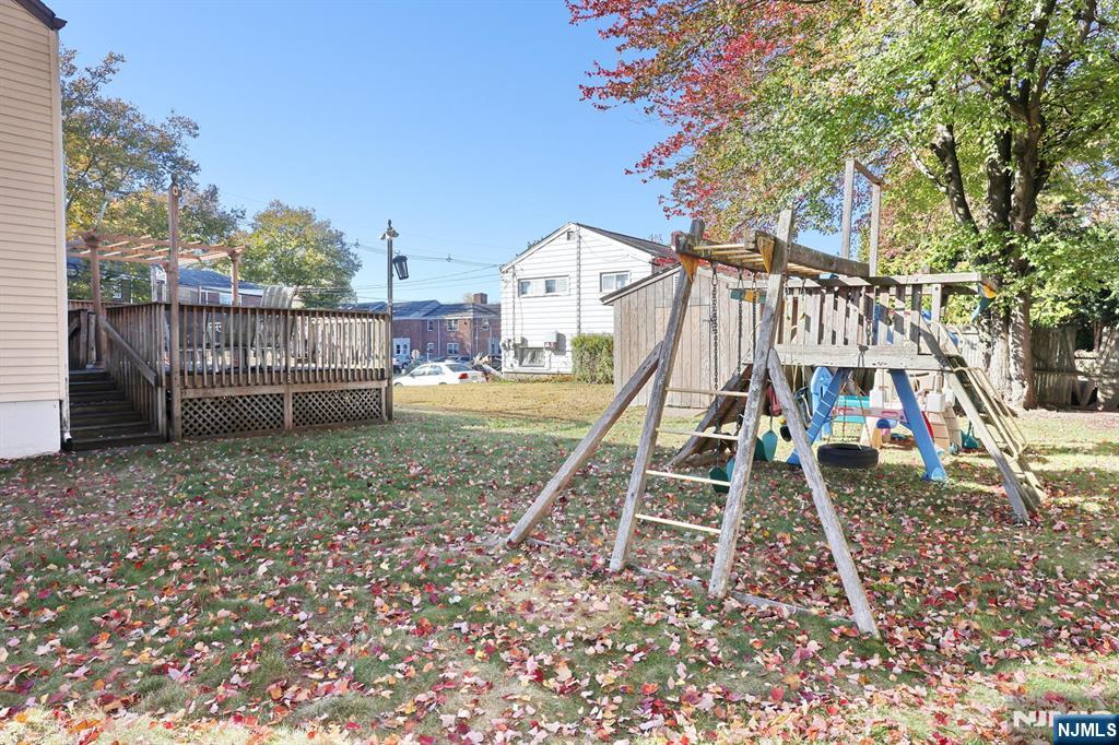 40 Depew Street Dumont, NJ 07628 - Photo 37 of 38 a backyard of a house with wooden stairs
