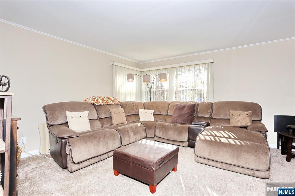 40 Depew Street Dumont, NJ 07628 - Photo 5 of 38 a living room with furniture and a large window
