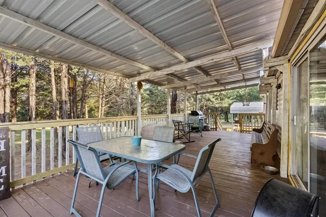 a view of a tree in front of a house