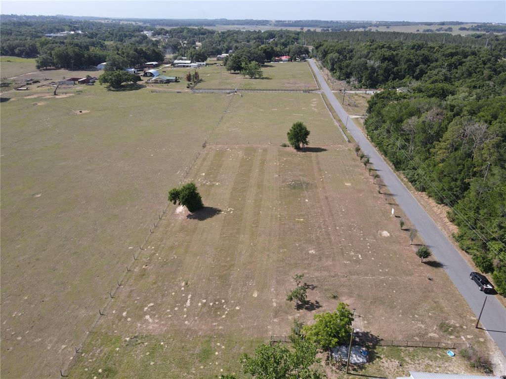 1 Smith Road Dade City, FL 33525 - Photo 11 of 25 an aerial view of a house with a yard